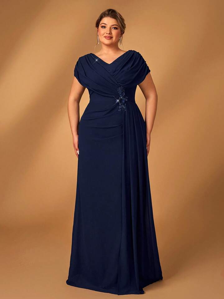 Vestido azul marino con escote en V y aplicación lentejuelas en cintura