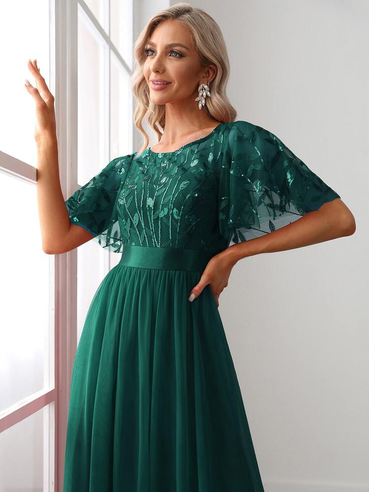 Vestido verde esmeralda aplicación lentejuelas y falda tul