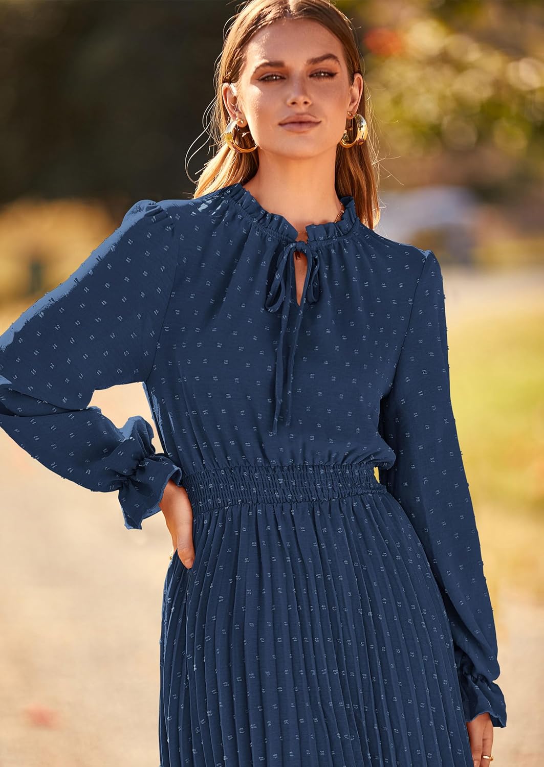 Vestido azul marino manga larga plisado