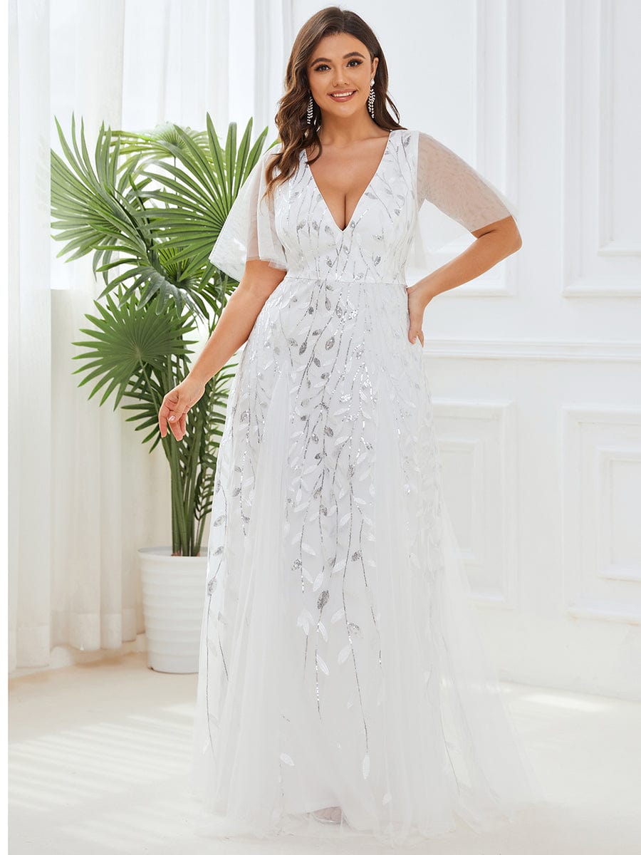 Vestido blanco con lentejuelas plateadas con escote en V