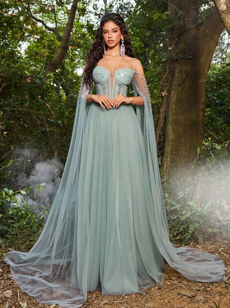 Vestido verde sage con transparencia manga capa de  tul
