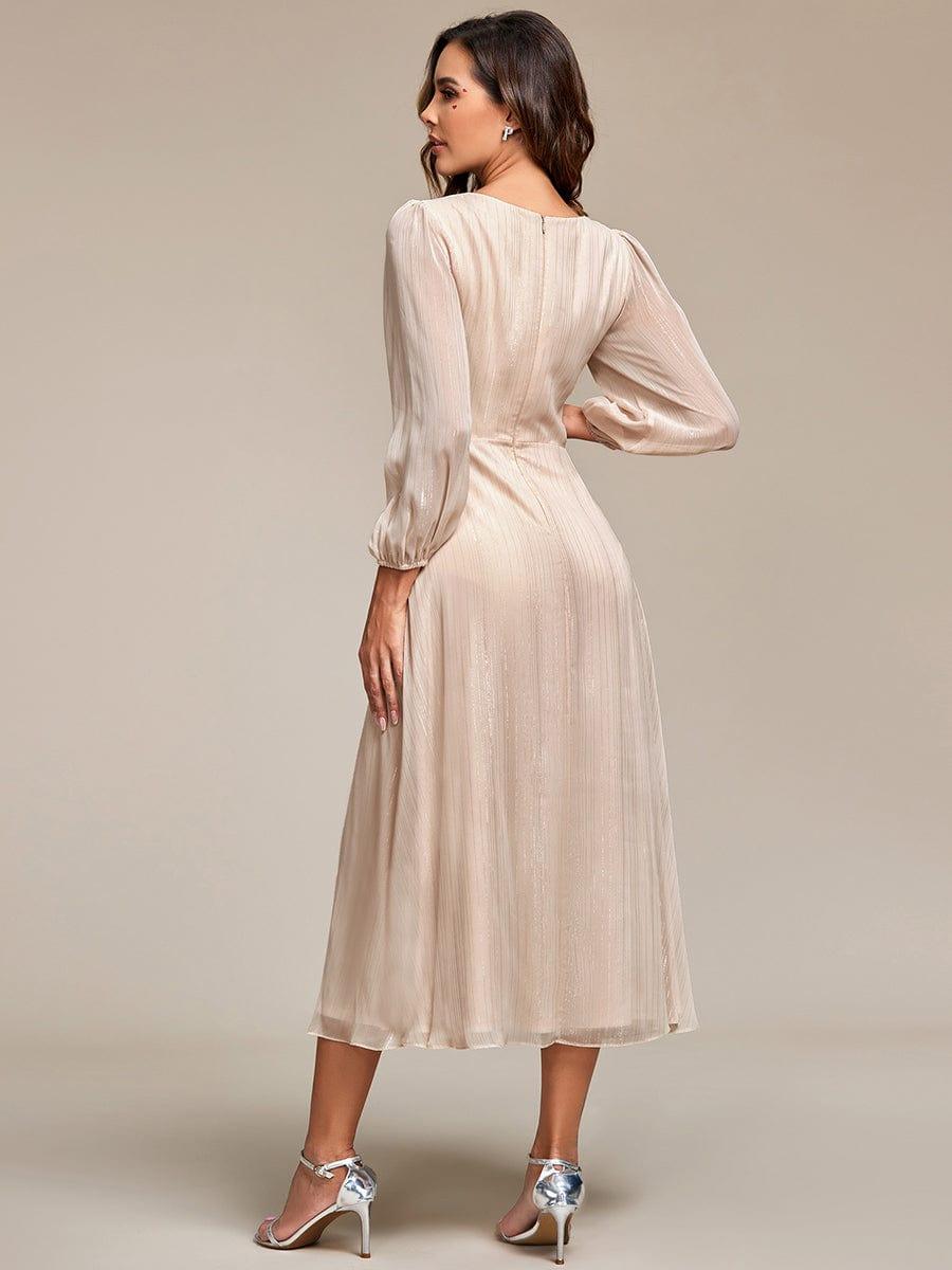 Vestido champagne con brillo manga larga