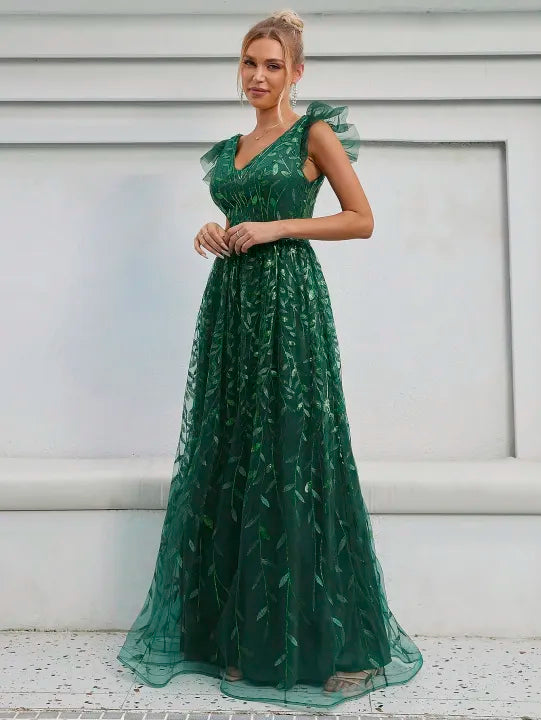 Vestido lentejuelas y tul corte A verde esmeralda