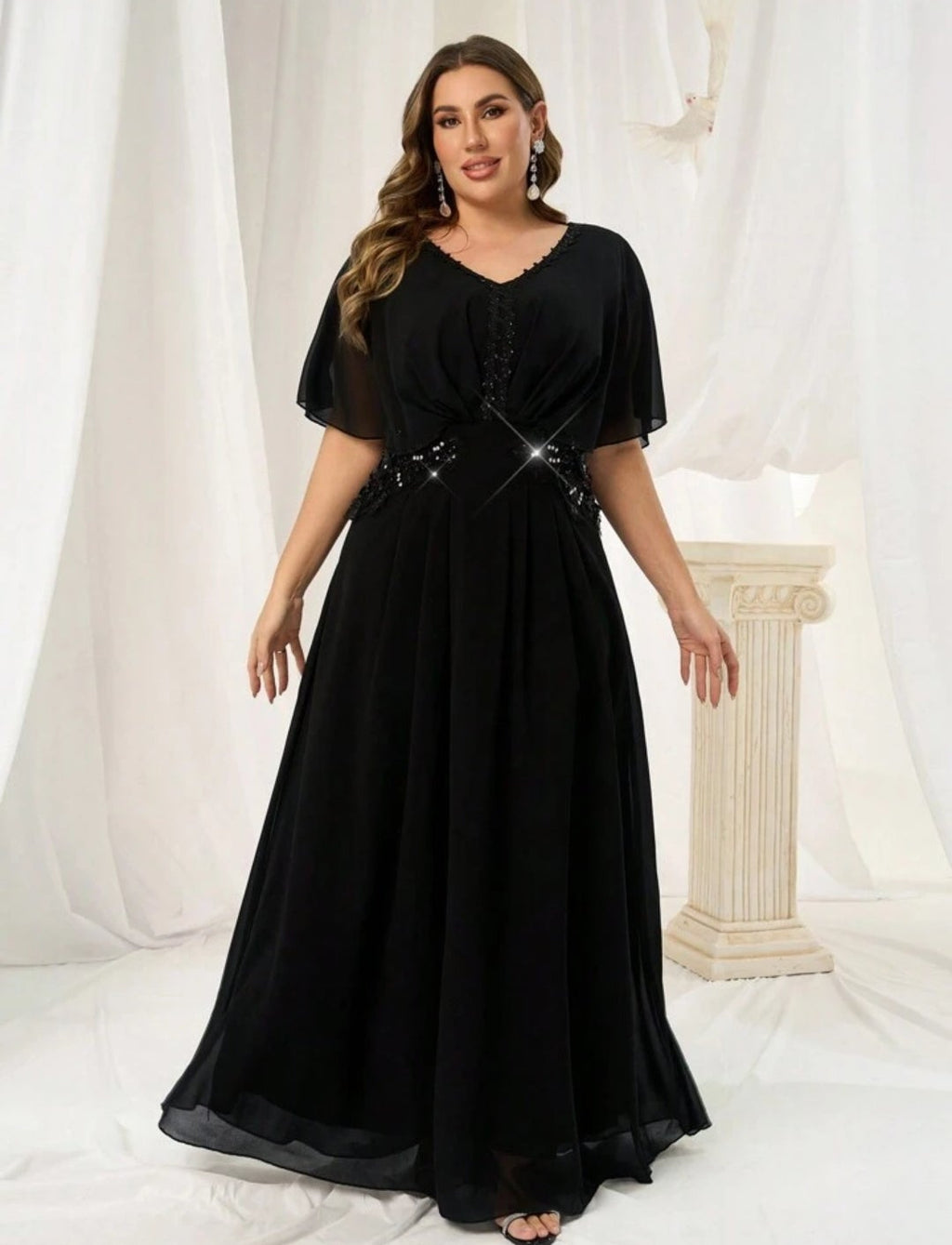 Vestido negro corte A manga corta