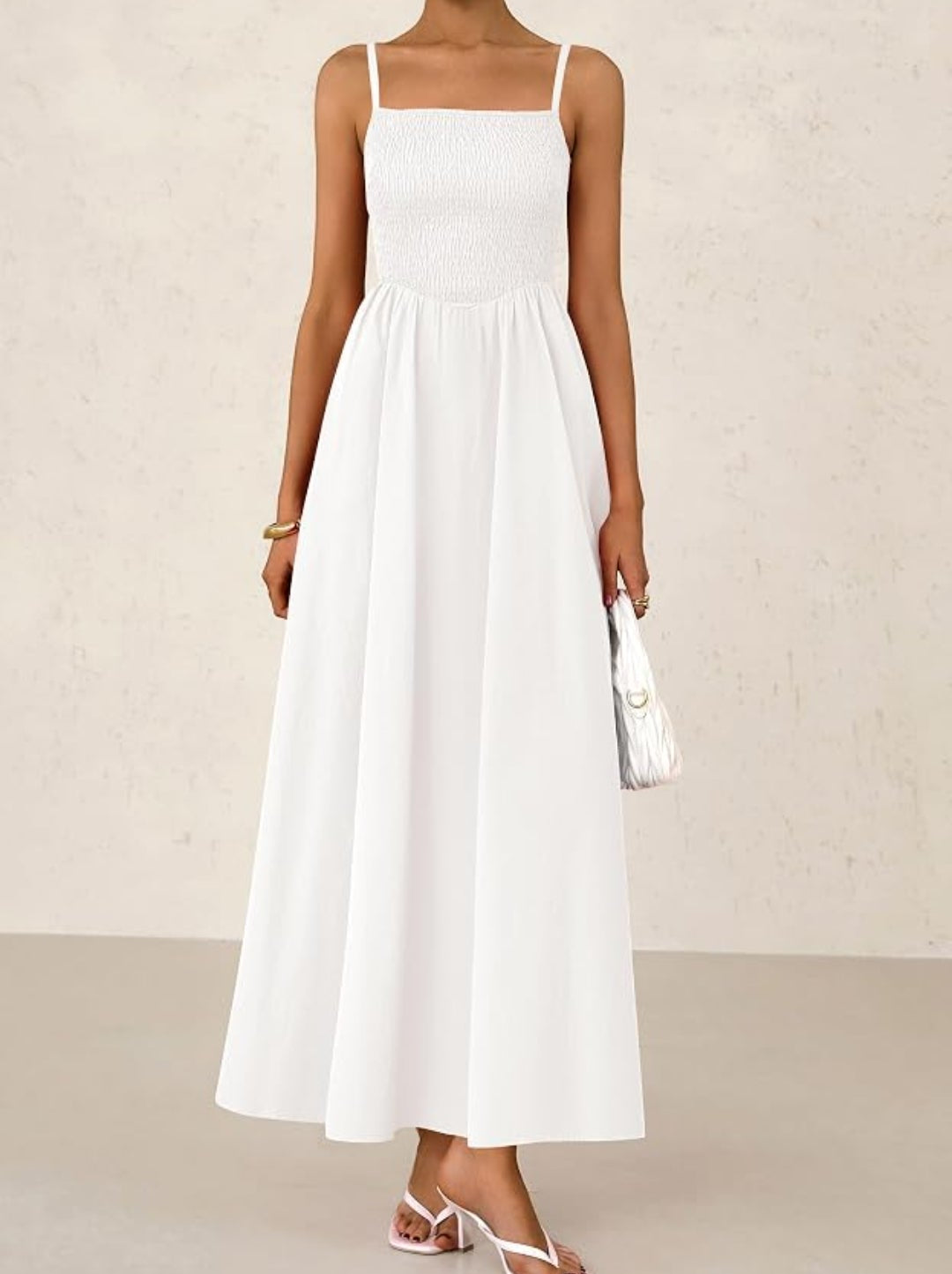 Vestido blanco spaguetti con bolsas invisibles tirante delgado