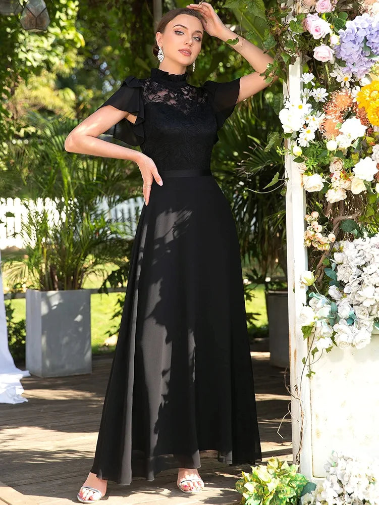 Vestido negro cuello alto con encaje y falda chiffon