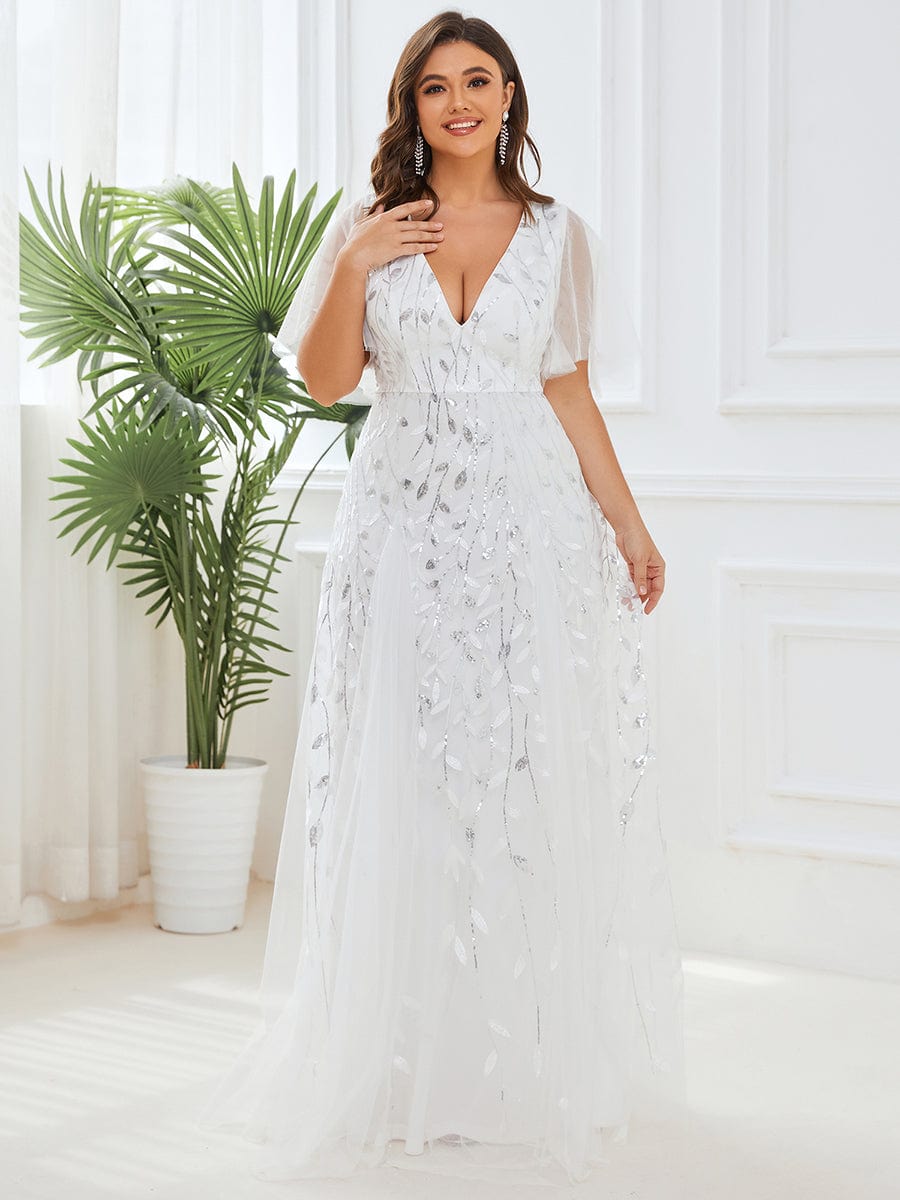 Vestido blanco con lentejuelas plateadas con escote en V