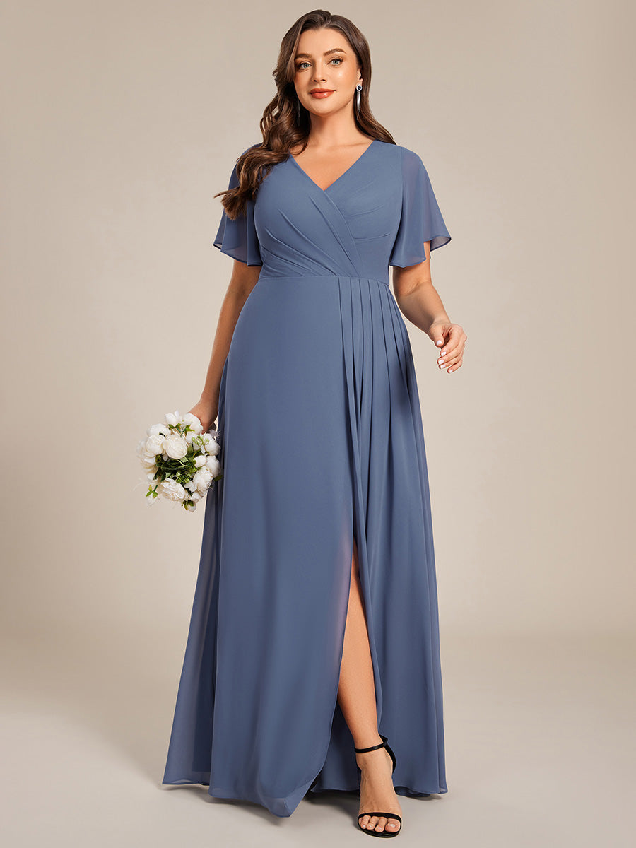 Vestido dusty blue corte A manga corta con abertura lateral