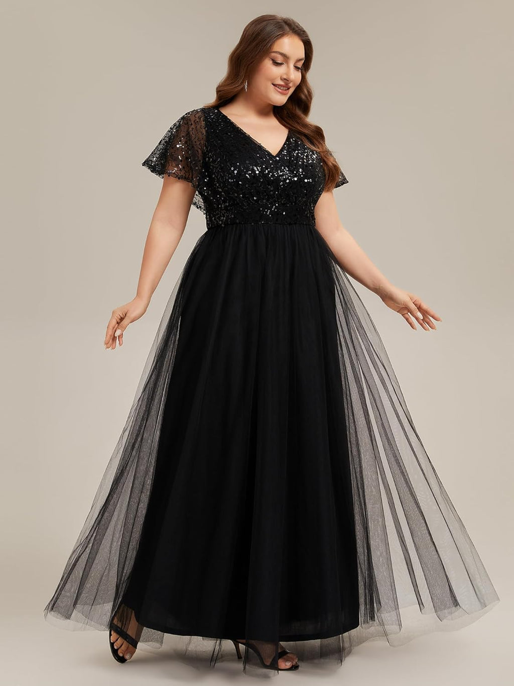Vestido negro lentejuelas y falda tul