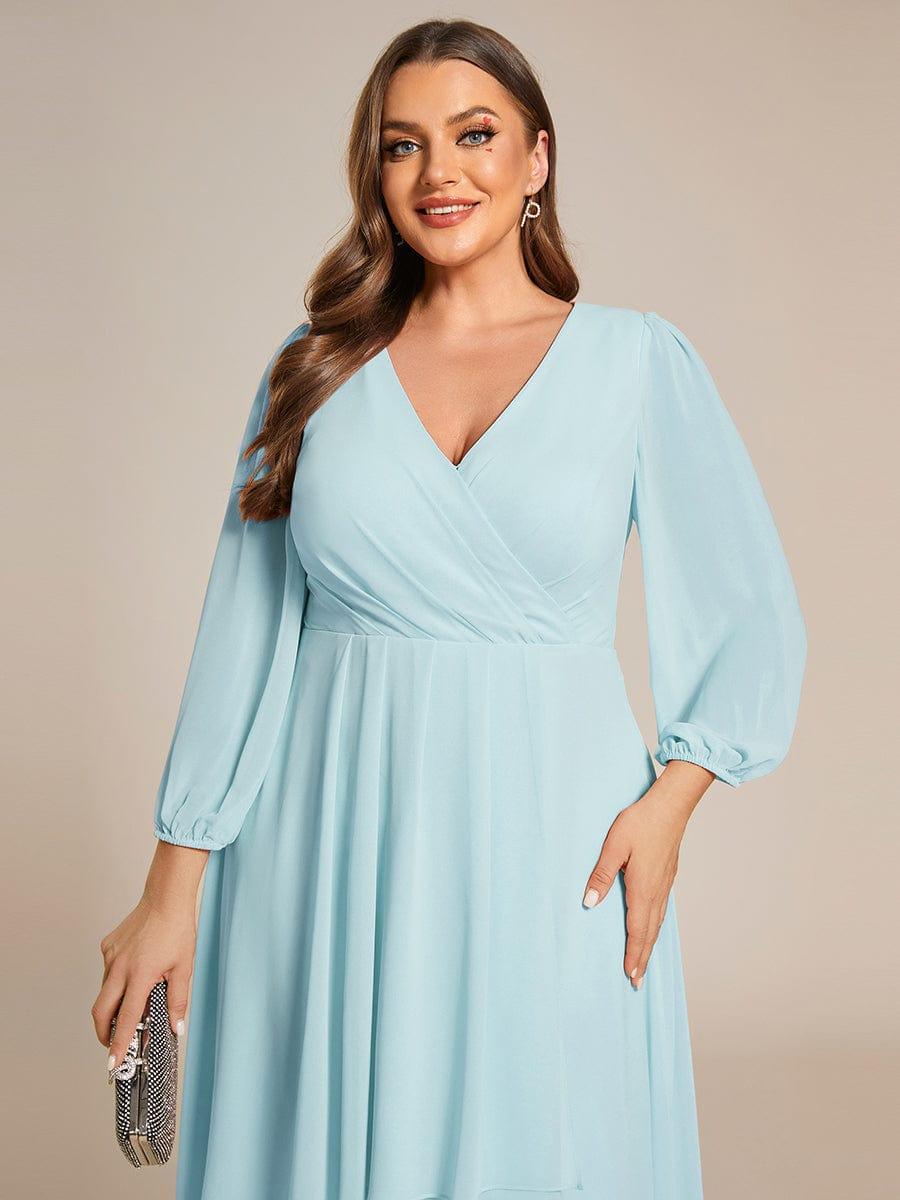 Vestido celeste manga larga con escote en V
