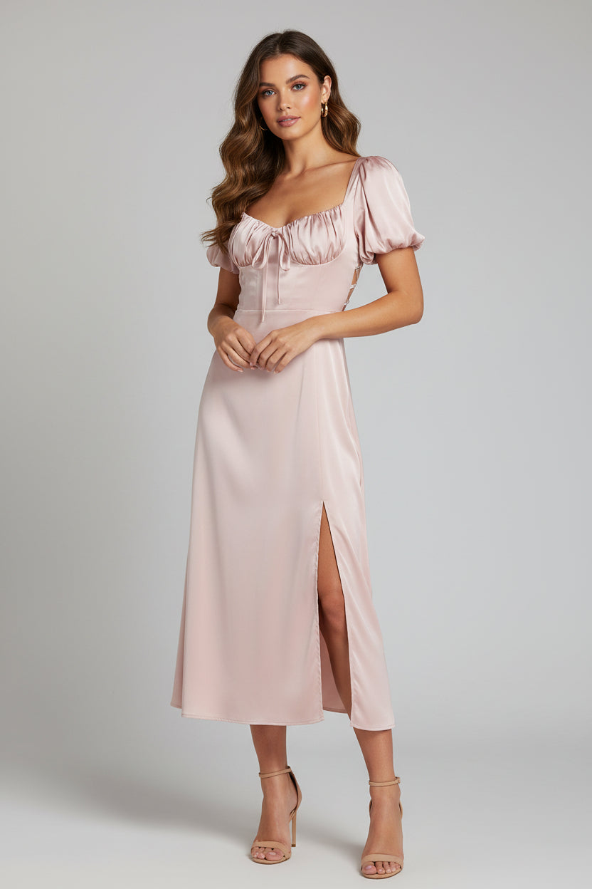 Vestido rosa satinado espalda abierta con abertura lateral