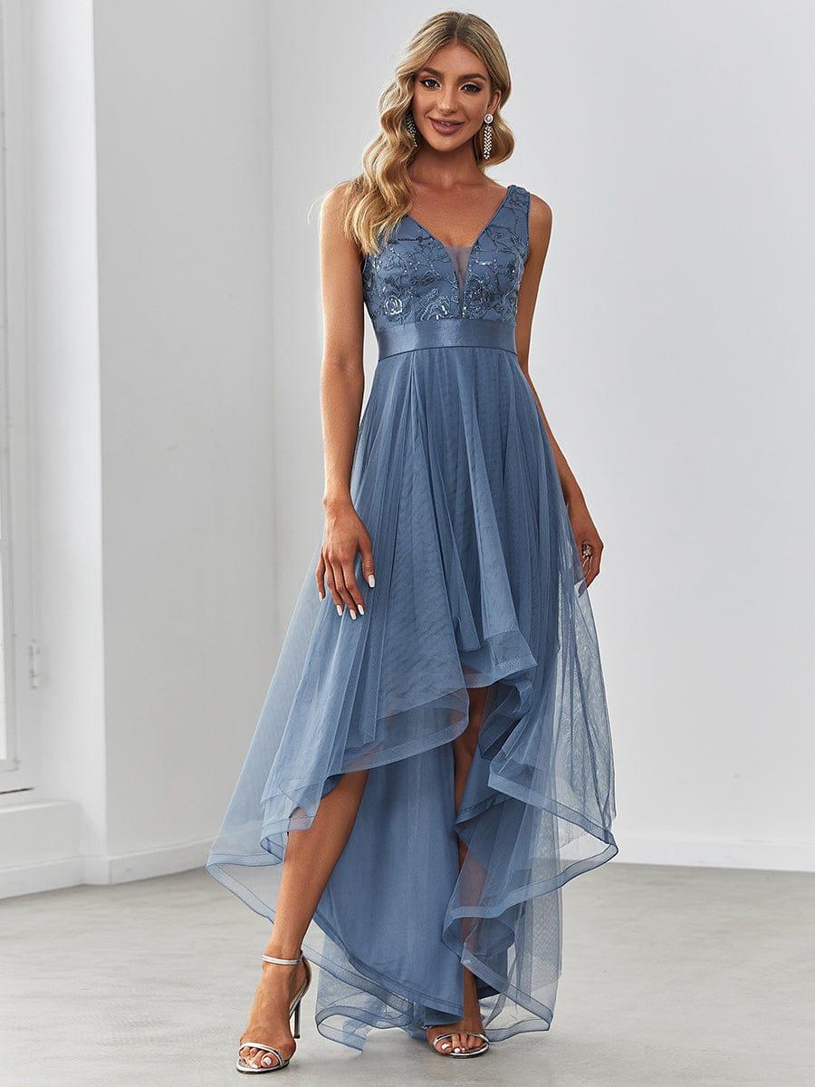Vestido dusty blue con lentejuelas y falda cola de pato tul