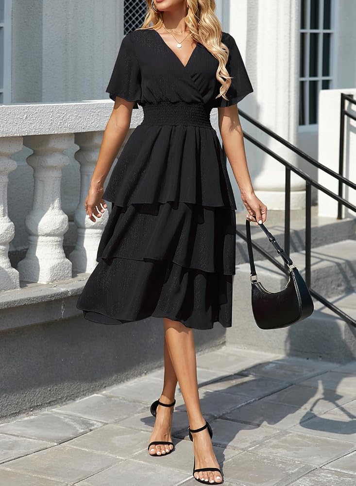 Vestido midi negro con capas y brillo manga corta