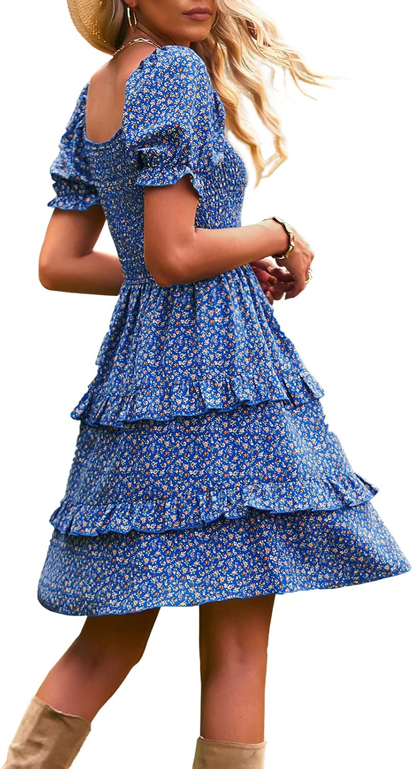 Vestido azul con flores pequeñas falda capas