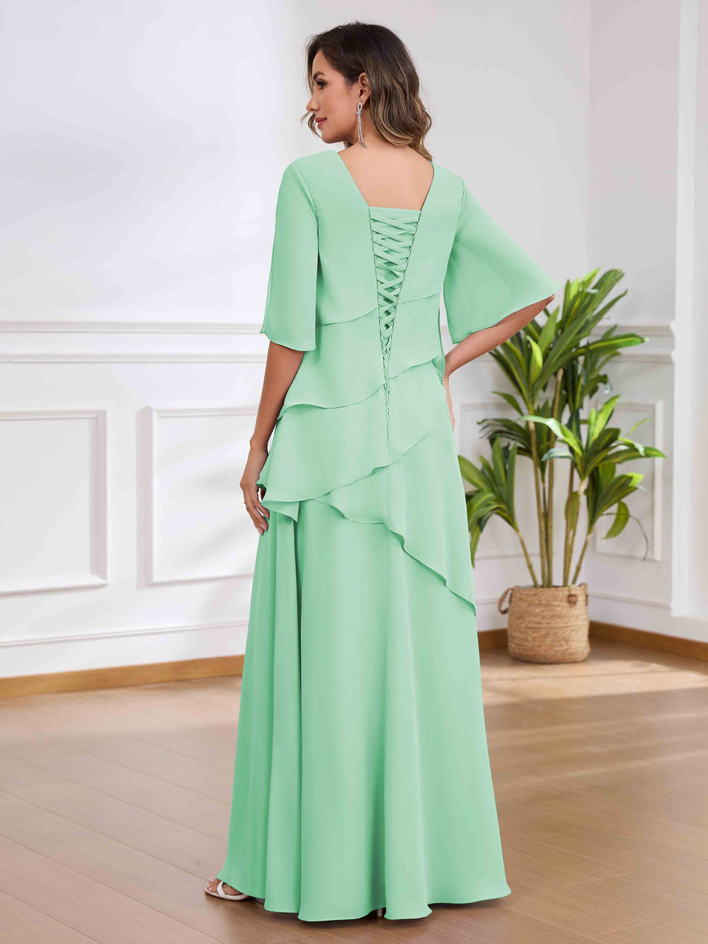 Vestido verde menta con drapeado corte recto