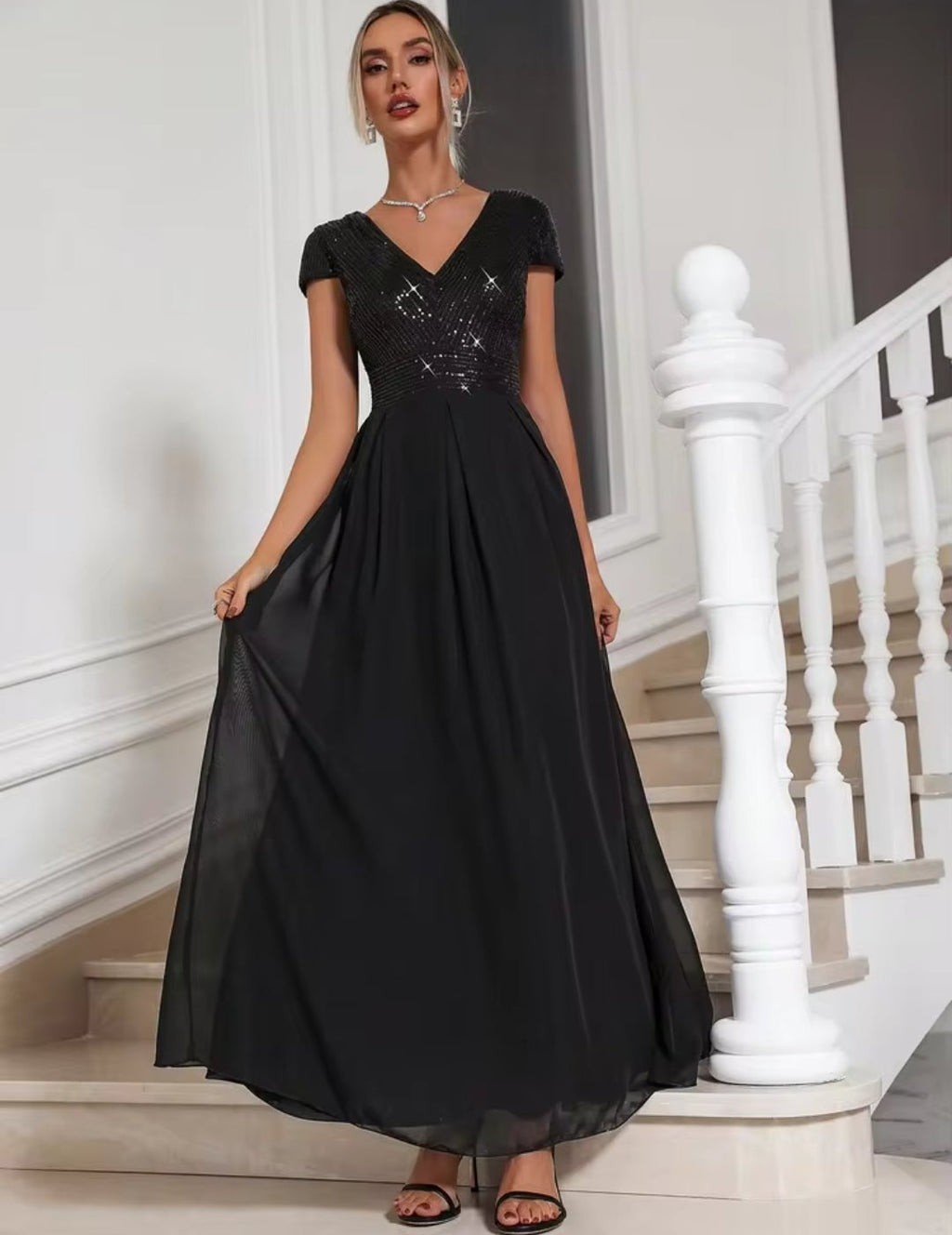Vestido negro lentejuelas y falda chiffon
