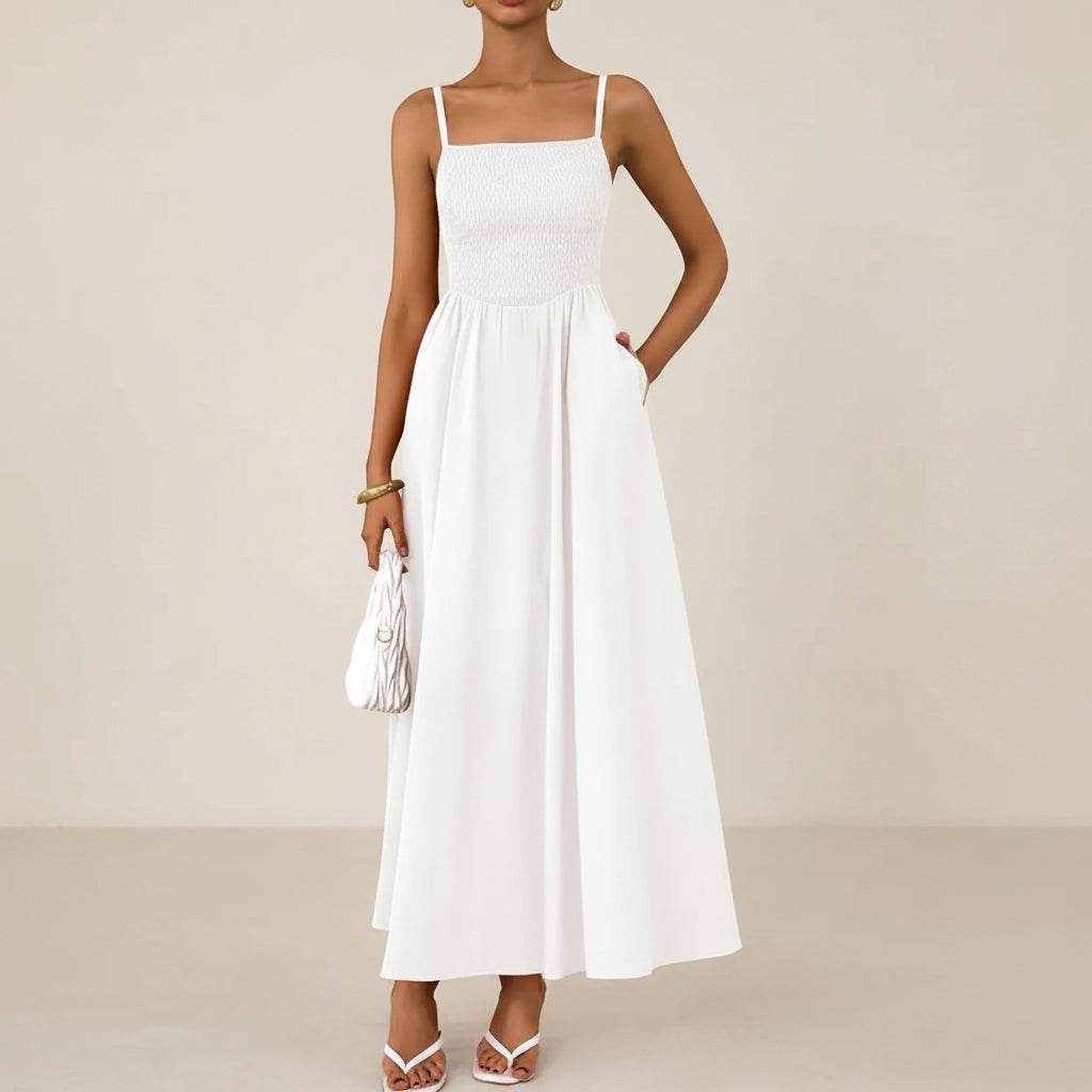 Vestido blanco spaguetti con bolsas invisibles tirante delgado