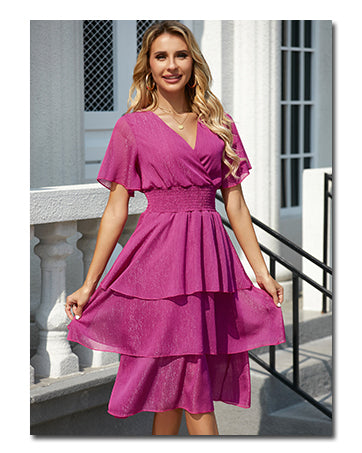 Vestido fucsia con capas y brillo manga corta