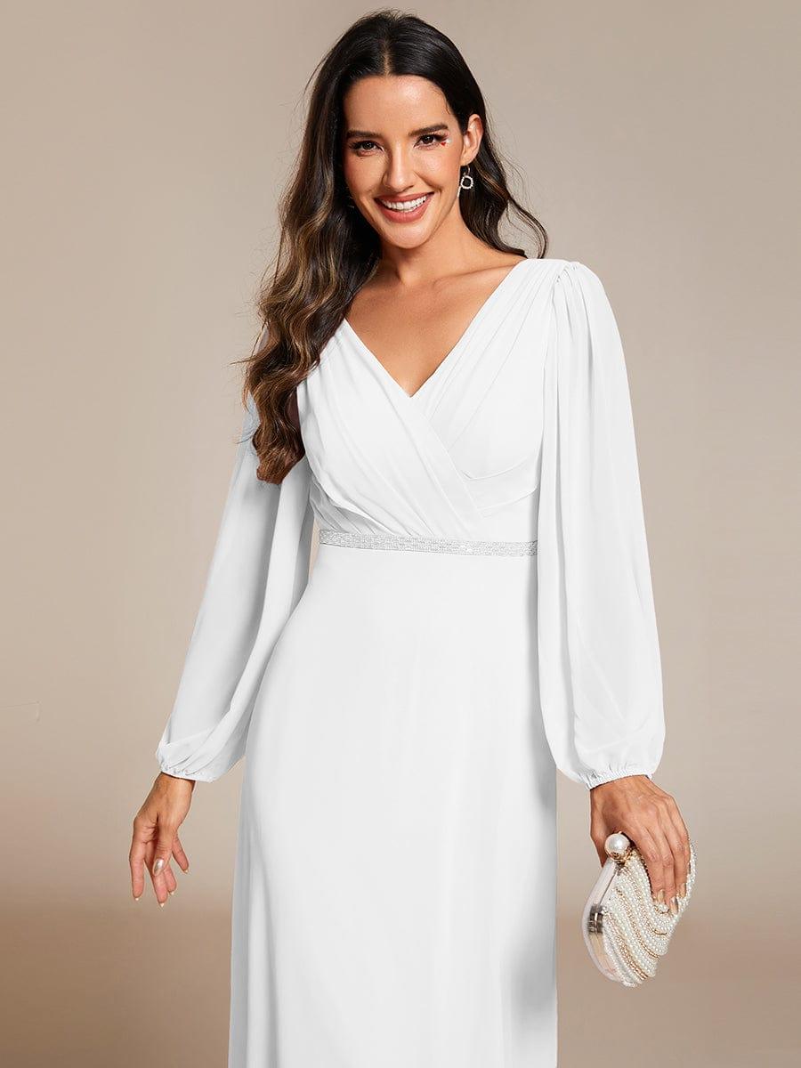 Vestido blanco manga larga corte A con aplicación plateada