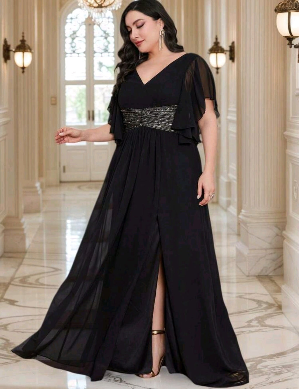Vestido negro con lentejuelas plateadas manga corta