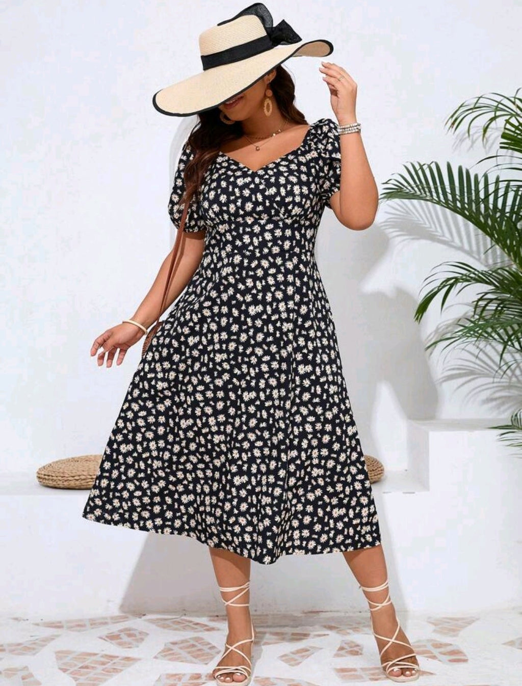 Vestido negro con flores blancas y amarillo