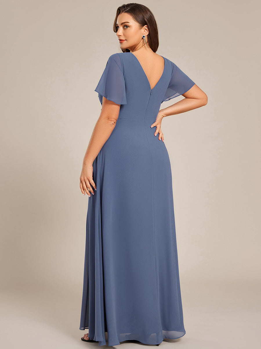 Vestido dusty blue corte A manga corta con abertura lateral