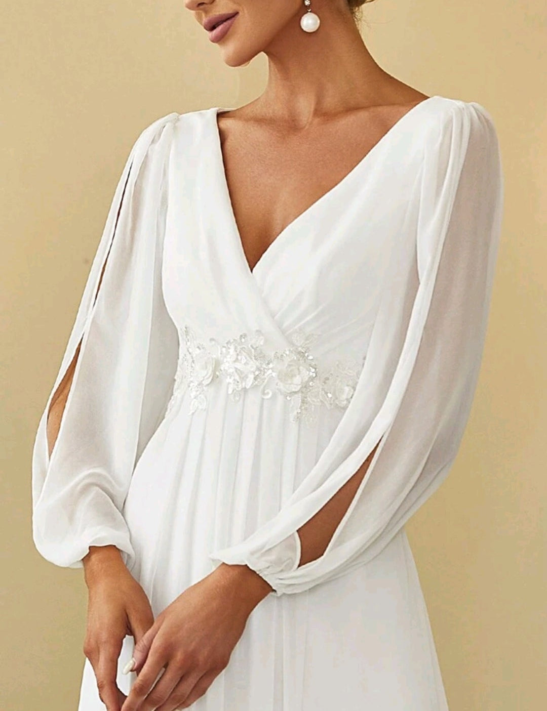 Vestido blanco manga larga corte A con escote en V