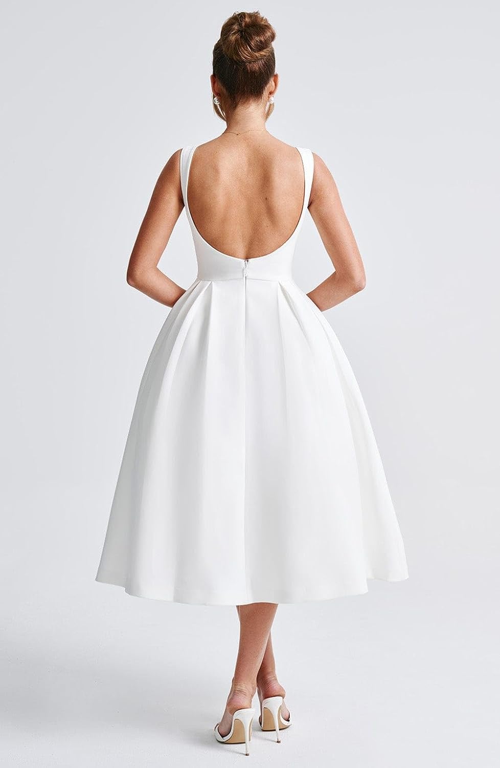Vestido formal blanco corte A sin manga espalda semi abierta