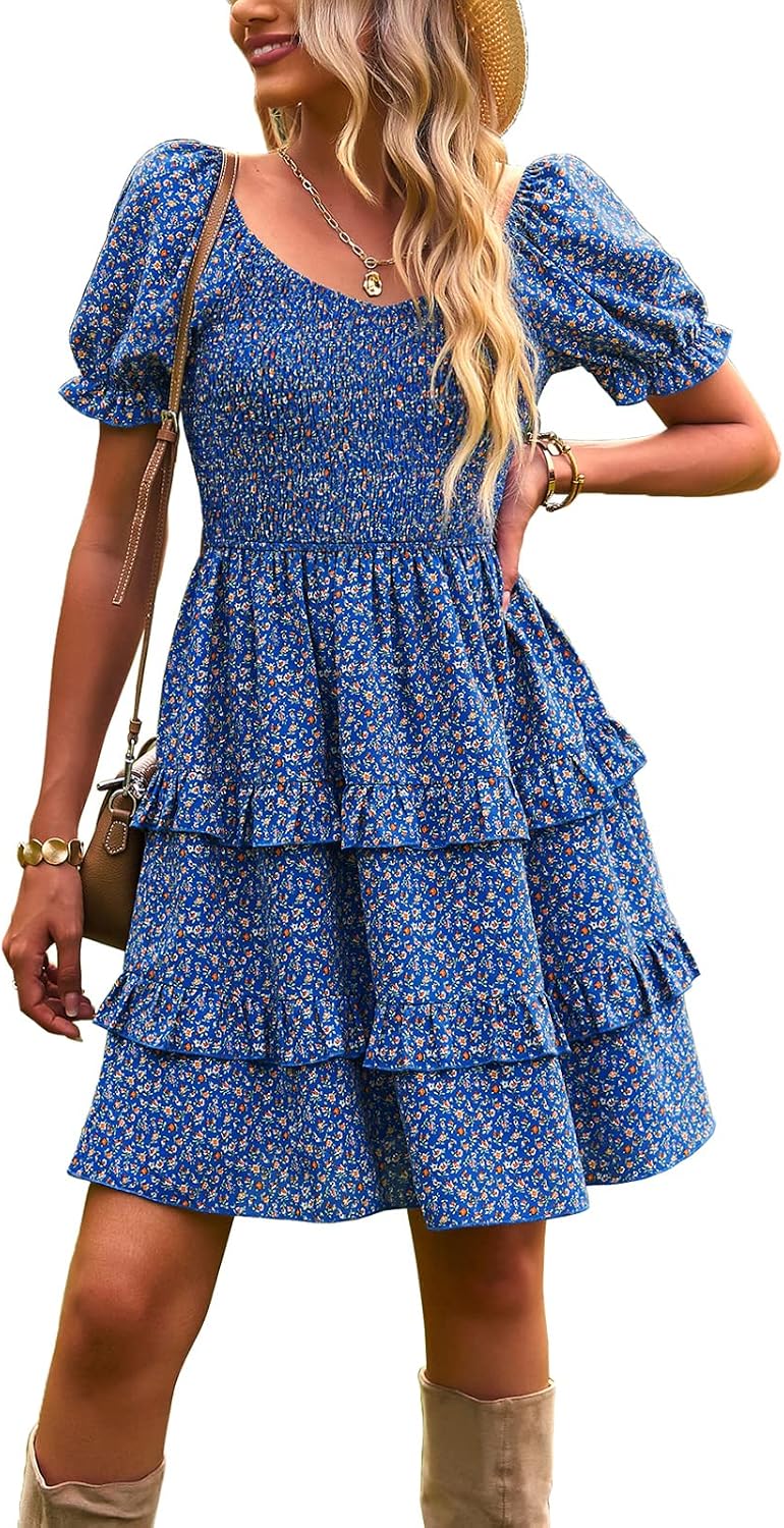 Vestido azul con flores pequeñas falda capas