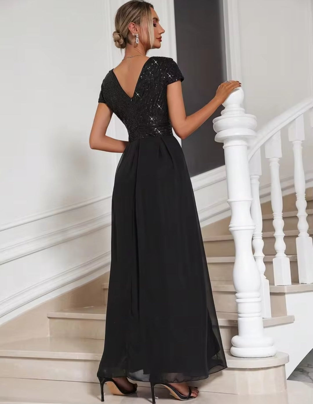 Vestido negro lentejuelas y falda chiffon