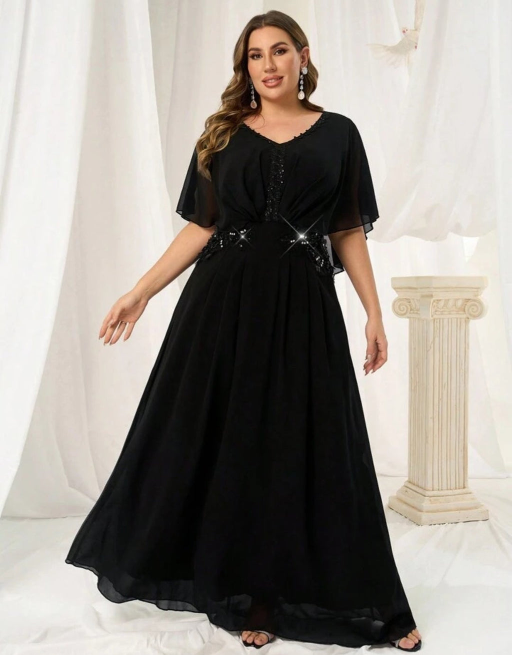 Vestido negro corte A manga corta