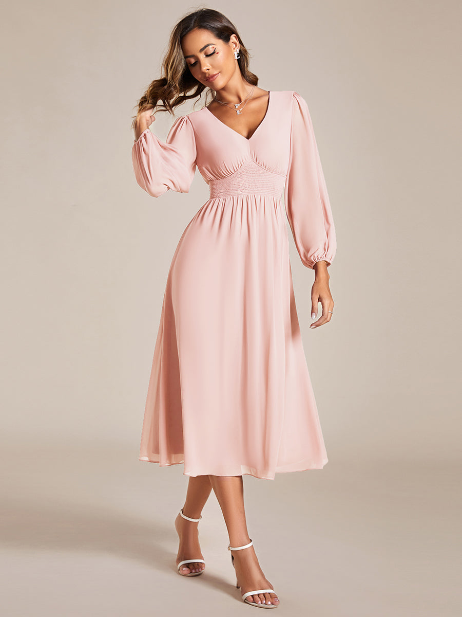 Vestido palo rosa midi manga larga