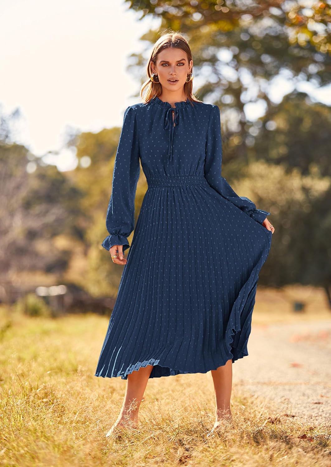 Vestido azul marino manga larga plisado