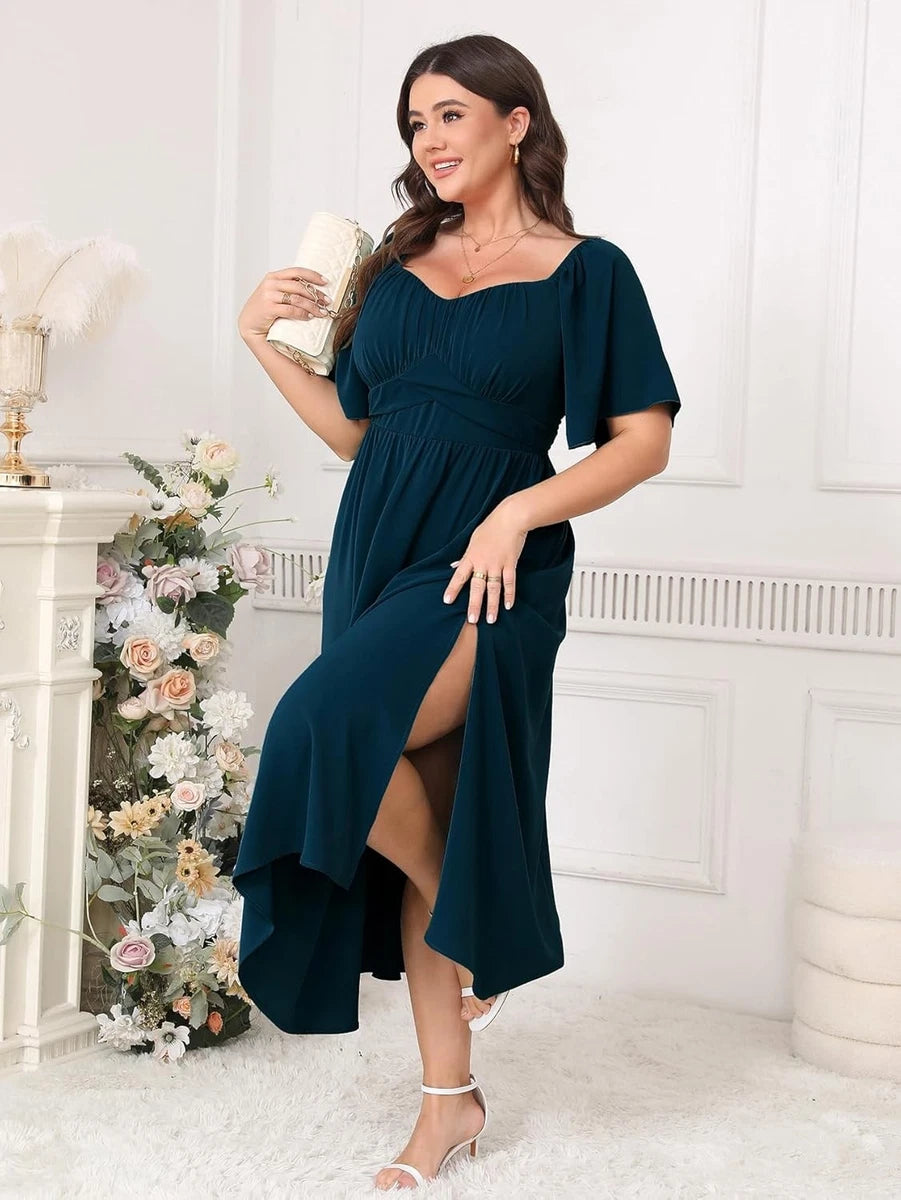 Vestido turquesa manga corta con abertura lateral