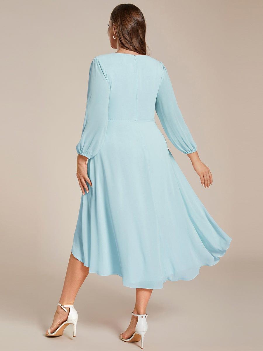 Vestido celeste manga larga con escote en V