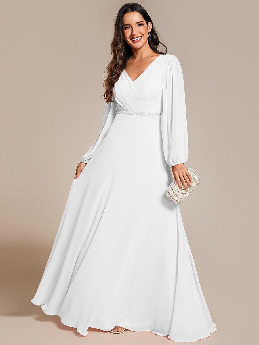 Vestido blanco manga larga corte A con aplicación plateada