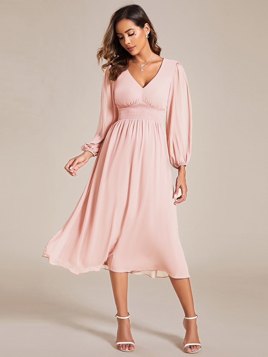 Vestido palo rosa midi manga larga