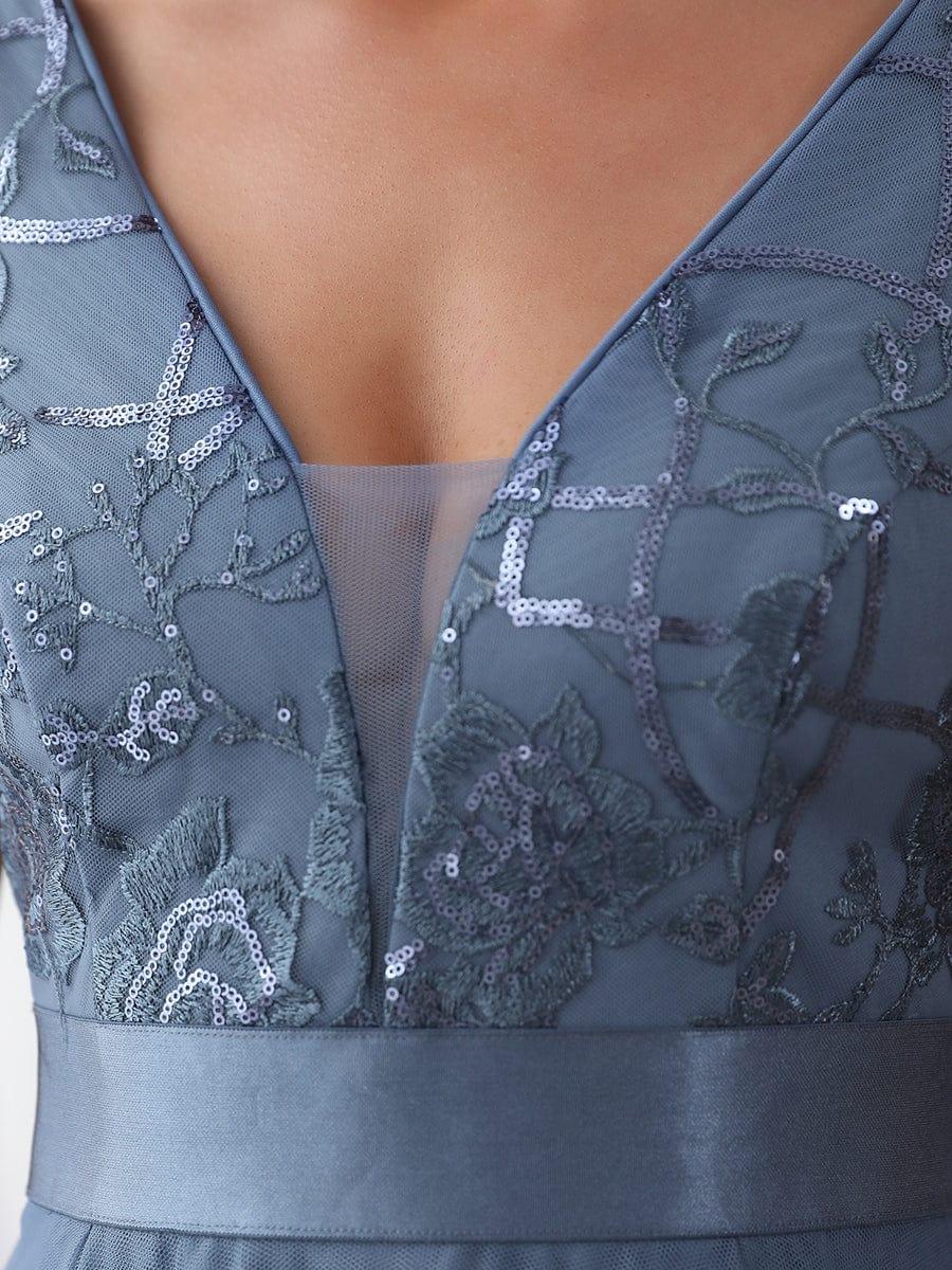 Vestido dusty blue con lentejuelas y falda cola de pato tul