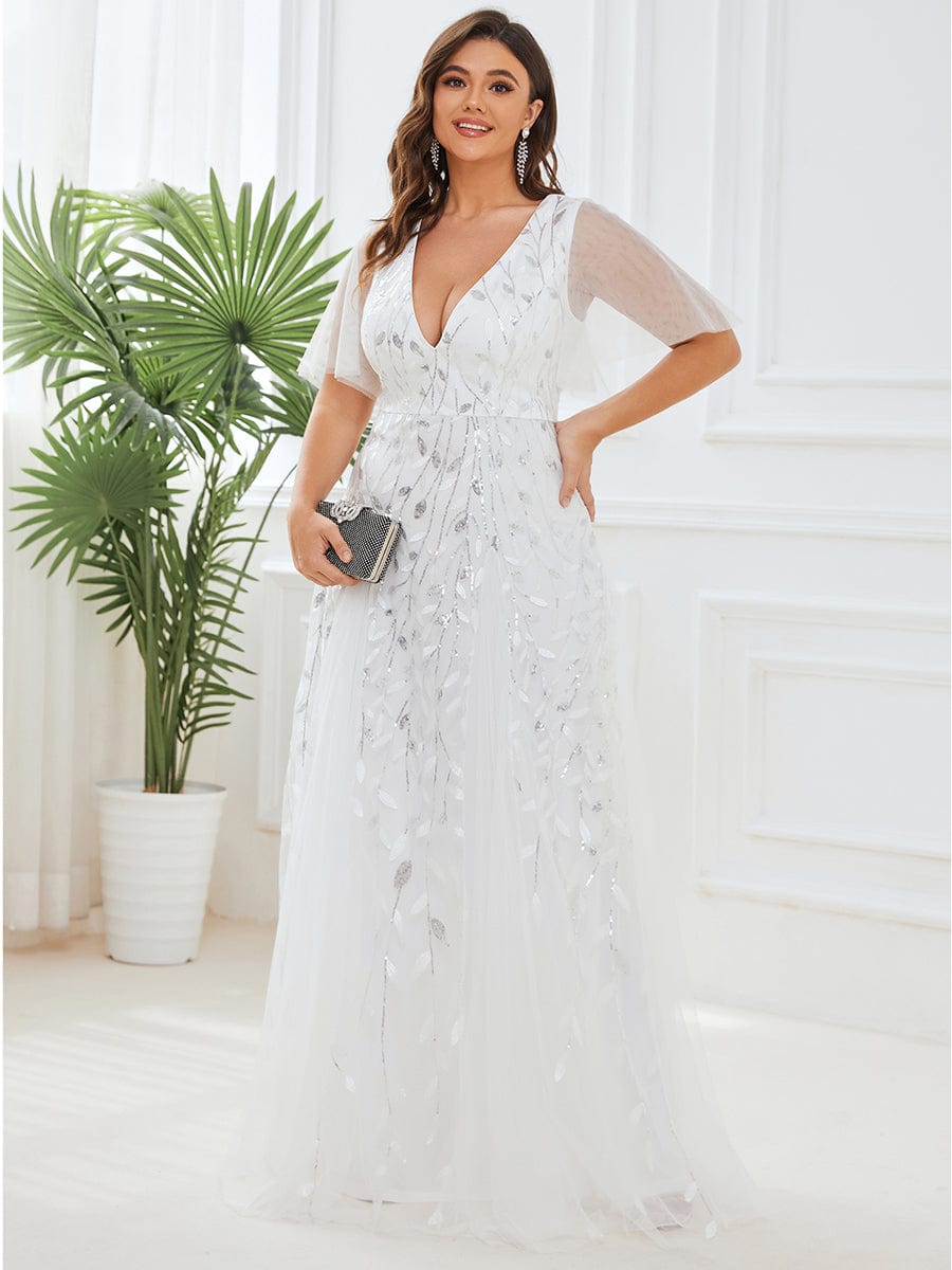 Vestido blanco con lentejuelas plateadas con escote en V