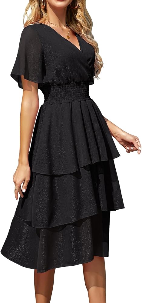 Vestido midi negro con capas y brillo manga corta
