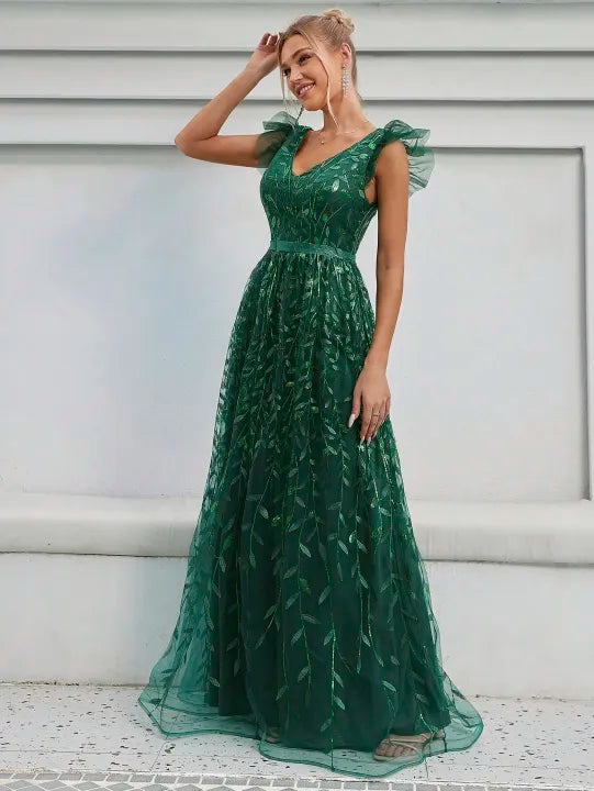 Vestido lentejuelas y tul corte A verde esmeralda